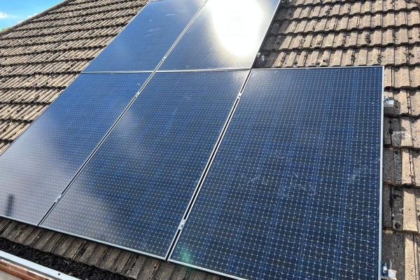 Array of 5 Eurener solar panels installed on roof