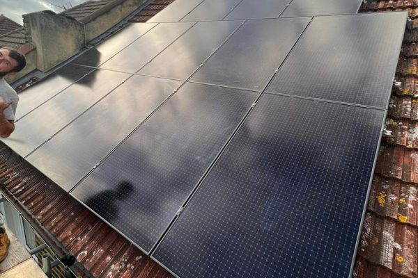 Array of 14 Eurener solar panels installed on roof