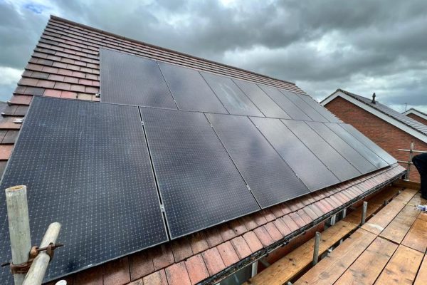 Array of 15 Eurener solar panels installed on roof